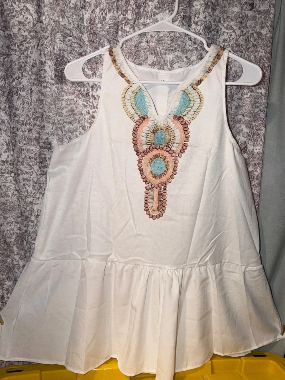White Embroidered Sleeveless Peplum Dress